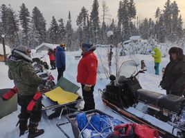 Small stop during the snowmobile transfer