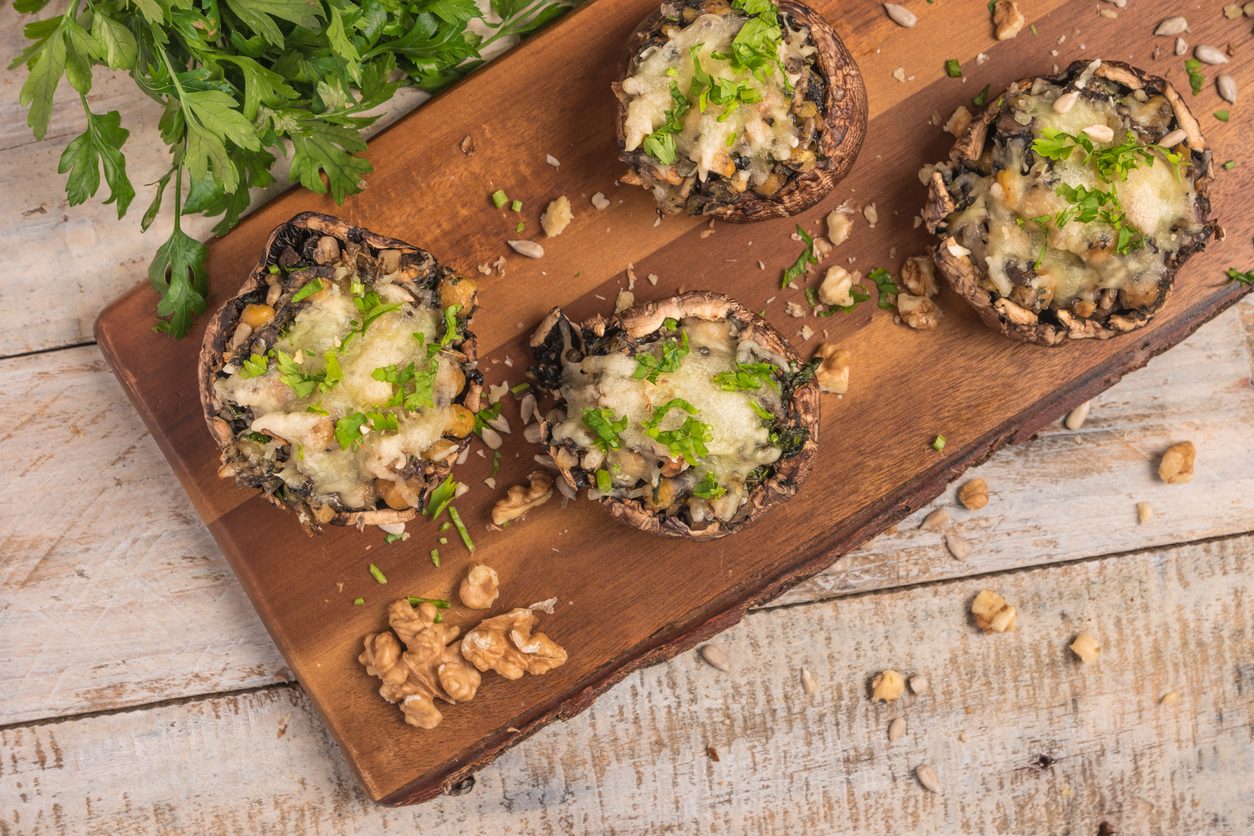 Top down view of mushrooms on a wooden board