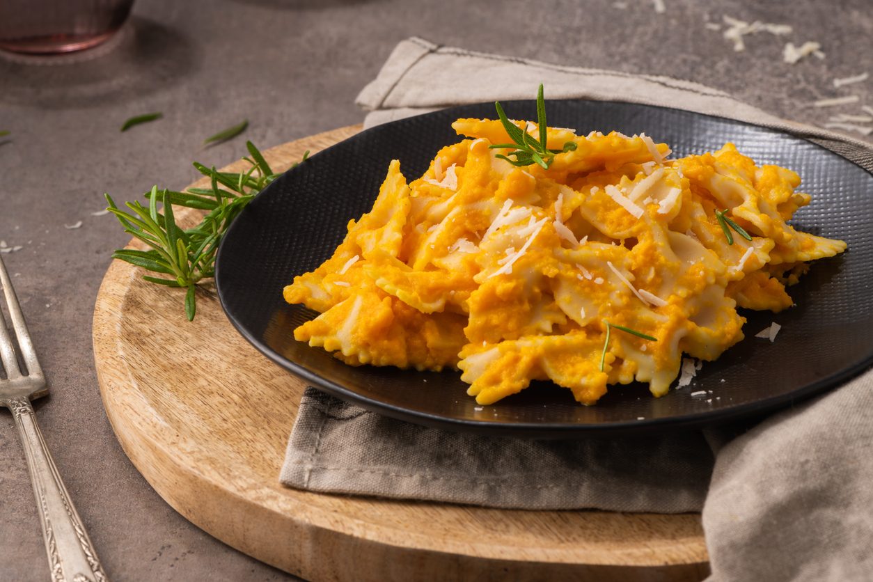 top down view of pasta on black plate