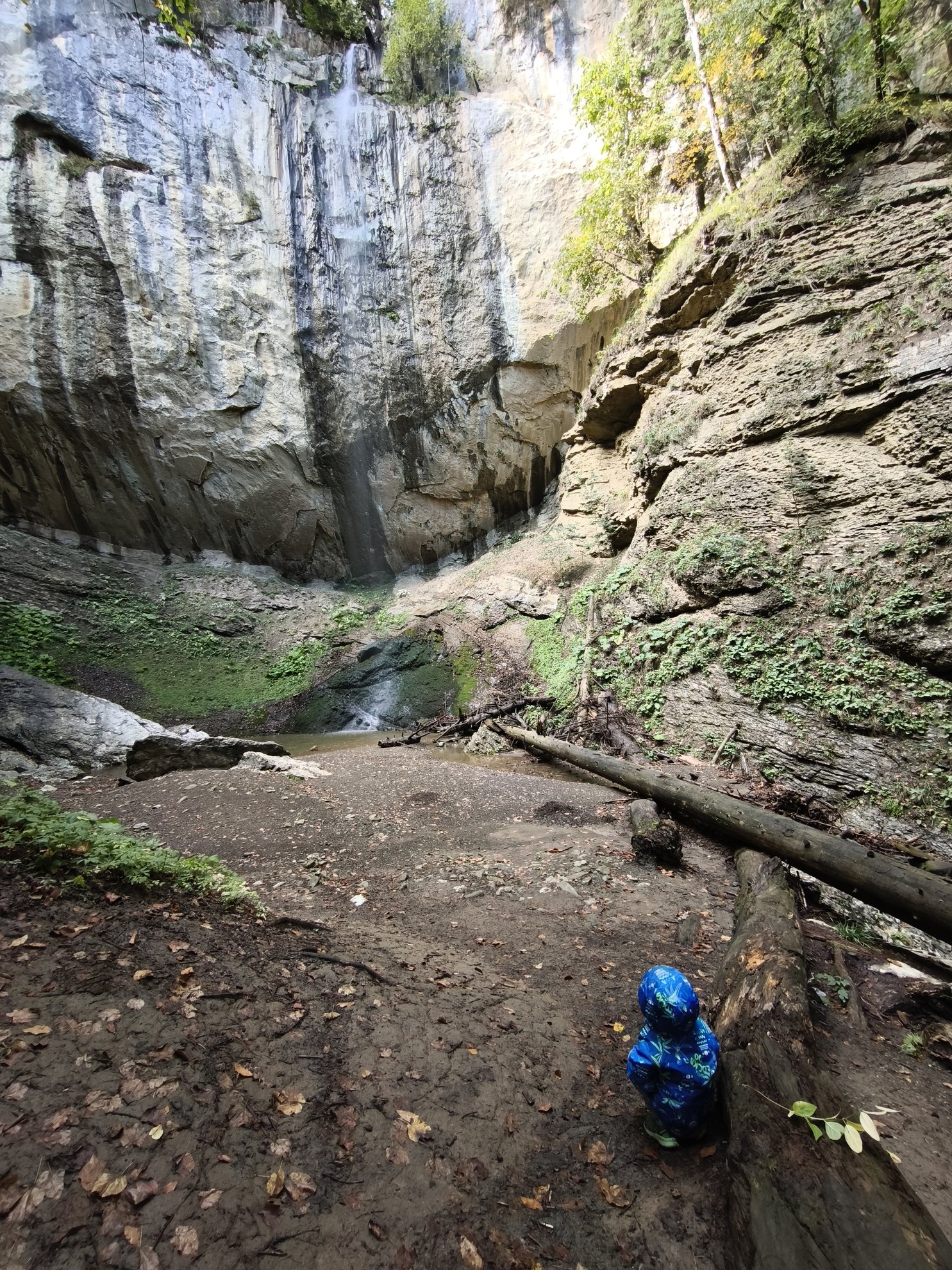 View of the cliff base and water pool