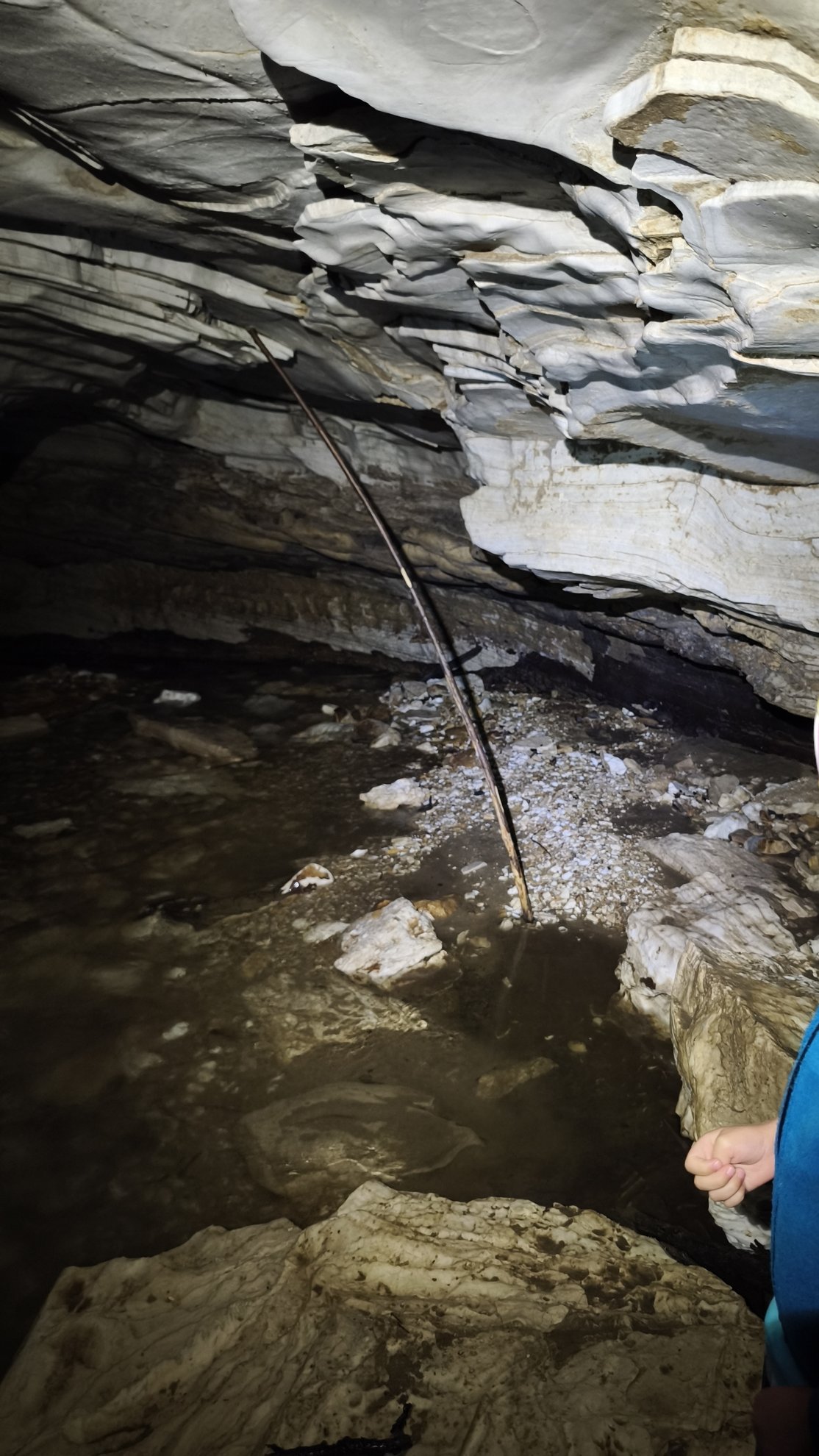 interior view of the cave showing water and rock formations